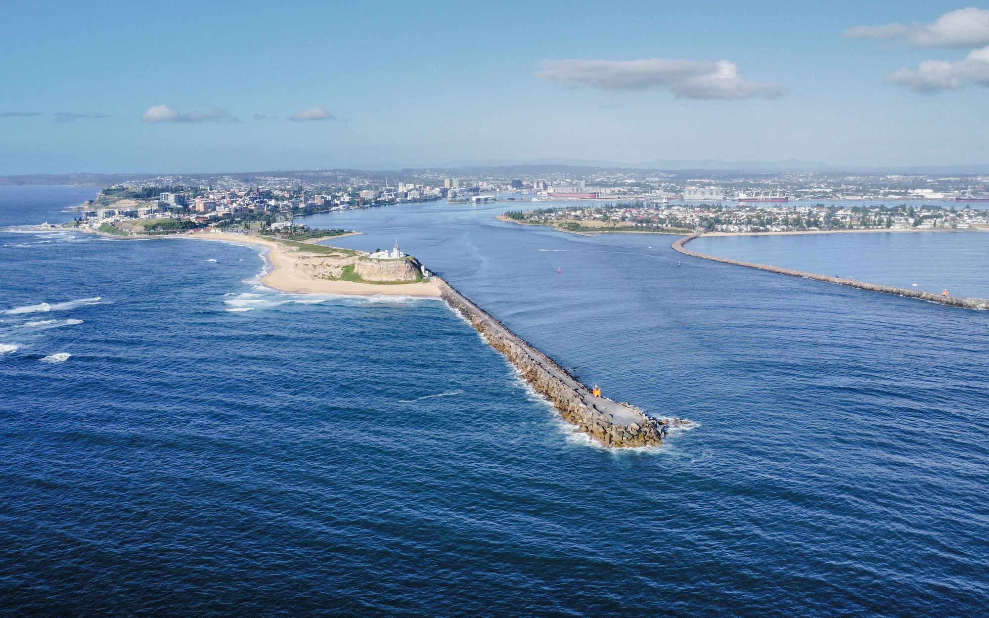 Nobbys Head, the breakwater, Newcastle Harbour and the city from high above the harbour mouth